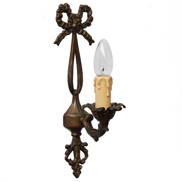"Manufactured in Ireland, this brass wall light is perfect for any traditional style setting."
