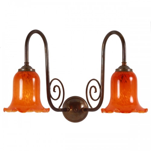 "Manufactured in Ireland, this traditional brass wall light comes complete with bell glass shades which when lit creates a warm homely glow."