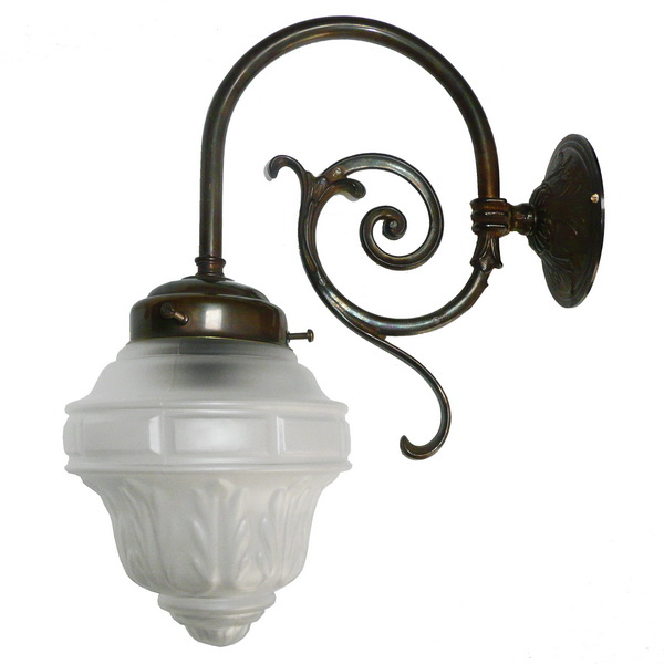 "Manufactured in Ireland, this quality brass wall light comes with a frosted pineapple glass shade looks great in any traditional style setting."