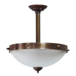 "Manufactured in Ireland, this traditional antique brass and glass pendant is reminiscent of Victorian style lighting."