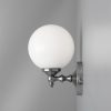 "Add a modern look to your home decor with the Cloghan Modern Globe Wall Light."