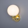 "Add a modern look to your home decor with the Cloghan Modern Globe Wall Light."