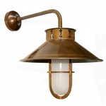 "Manufactured in Ireland, this quality brass factory wall light comes complete with frosted well glass shade."