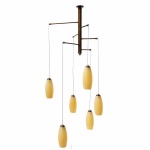 "Manufactured in Ireland, this modern quality brass fitting comes with cream alley glass shades."