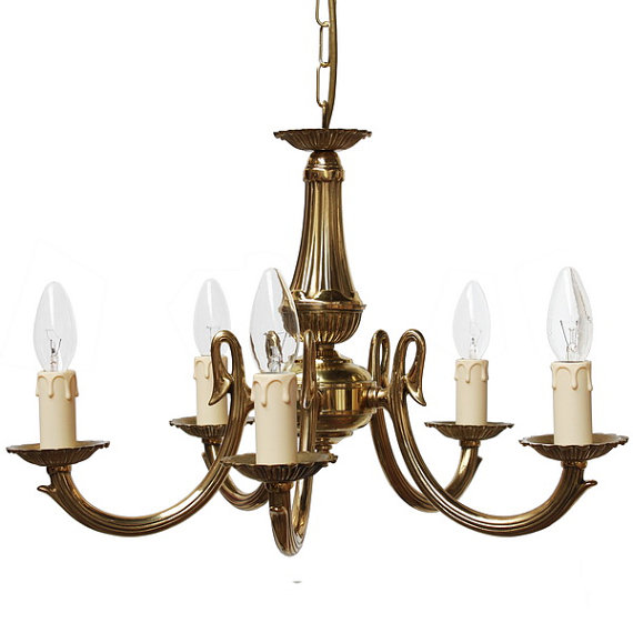 "Manufactured in Ireland, this quality brass Candelabra Chandelier would look great in any traditional style setting."