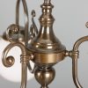 "Manufactured in Ireland, this quality brass chandelier comes complete with 200mm opal glass shades and is perfect for any traditional or brasserie style setting."