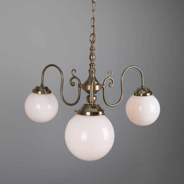 "Manufactured in Ireland, this quality brass chandelier comes complete with 200mm opal glass shades and is perfect for any traditional or brasserie style setting."