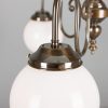 "Manufactured in Ireland, this quality brass chandelier comes complete with 200mm opal glass shades and is perfect for any traditional or brasserie style setting."