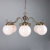 "Manufactured in Ireland, this quality brass traditional globe chandelier comes complete with 250mm opal globes."