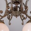 "Manufactured in Ireland, this quality brass traditional globe chandelier comes complete with 250mm opal globes."