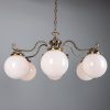 "Manufactured in Ireland, this quality brass traditional globe chandelier comes complete with 250mm opal globes."