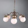 "Manufactured in Ireland, this quality brass traditional globe chandelier comes complete with 250mm opal globes."