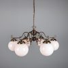 "Manufactured in Ireland, this quality brass traditional globe chandelier comes complete with 250mm opal globes."