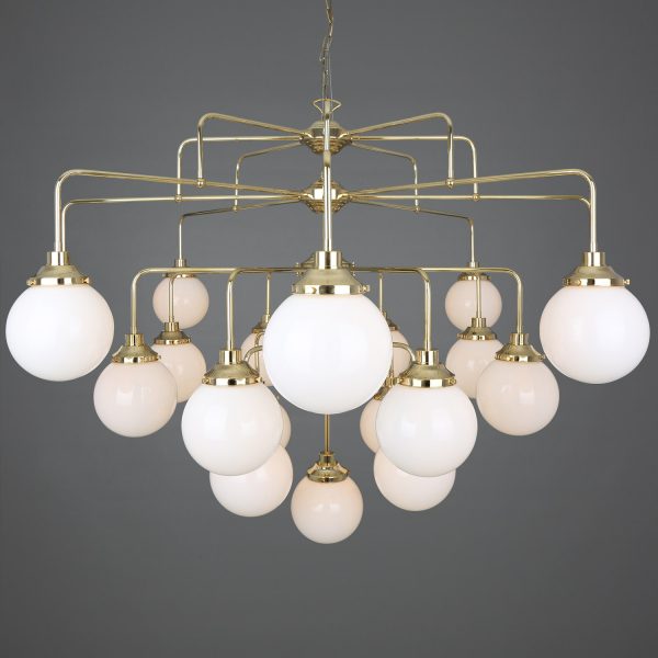 "The four-tier Rome chandelier is an impressive Mid-century design. This show stopping brass chandelier illuminates grand interiors."