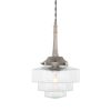 "The Novato pendant is a simple suspension that features a slender brass body, brass gallery and hexagonal stepped glass lamp shade."