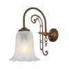 "The Medan single wall light is very traditional with a single swan-neck arm originating from a brass wall light rose. The arm holds a down lit opal etched glass bell shade that softens and diffuses the light within."